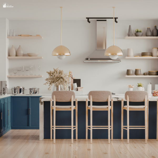 Bright, functional kitchen with durable finishes and seating, representing thoughtfully built homes designed for everyday living by long-term residents.