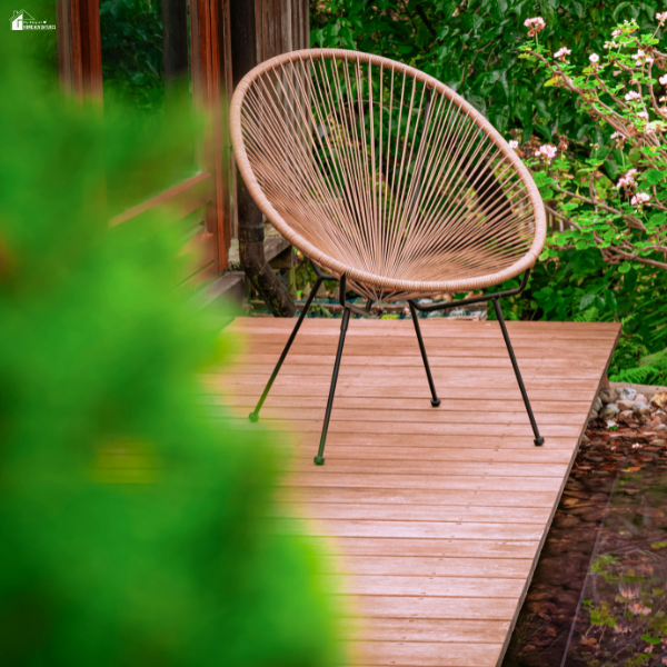 Chair positioned on an elevated wooden deck, representing secure framing and load-bearing design for outdoor platforms.