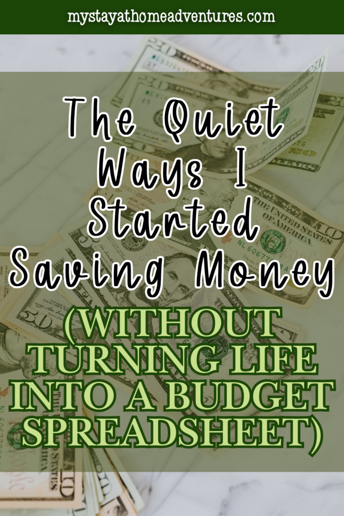 Stack of cash spread out on a surface, representing quiet ways to save money and build financial stability over time.