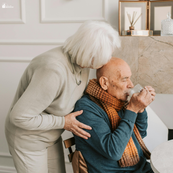 Elderly couple sharing a quiet moment at home, reflecting the importance of planning care and support for aging parents.