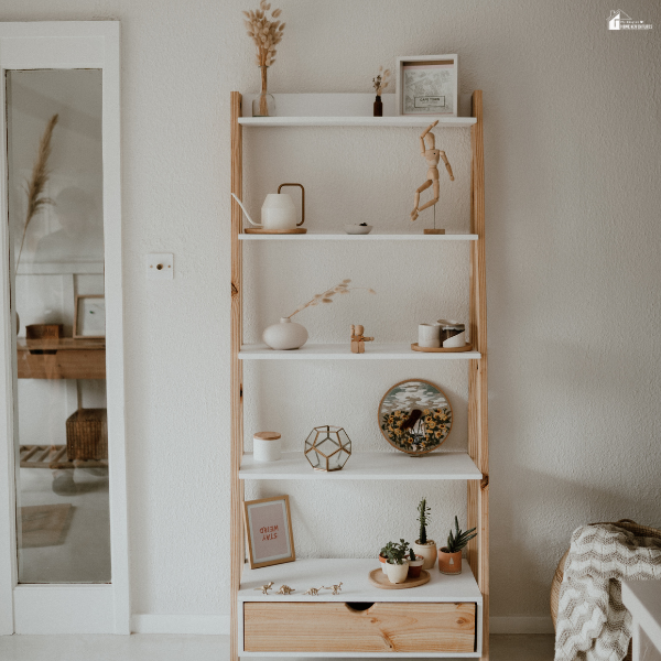 Minimalist wooden shelf styled with neutral decor, showing cozy and stylish home decor ideas for a calm and organized space.