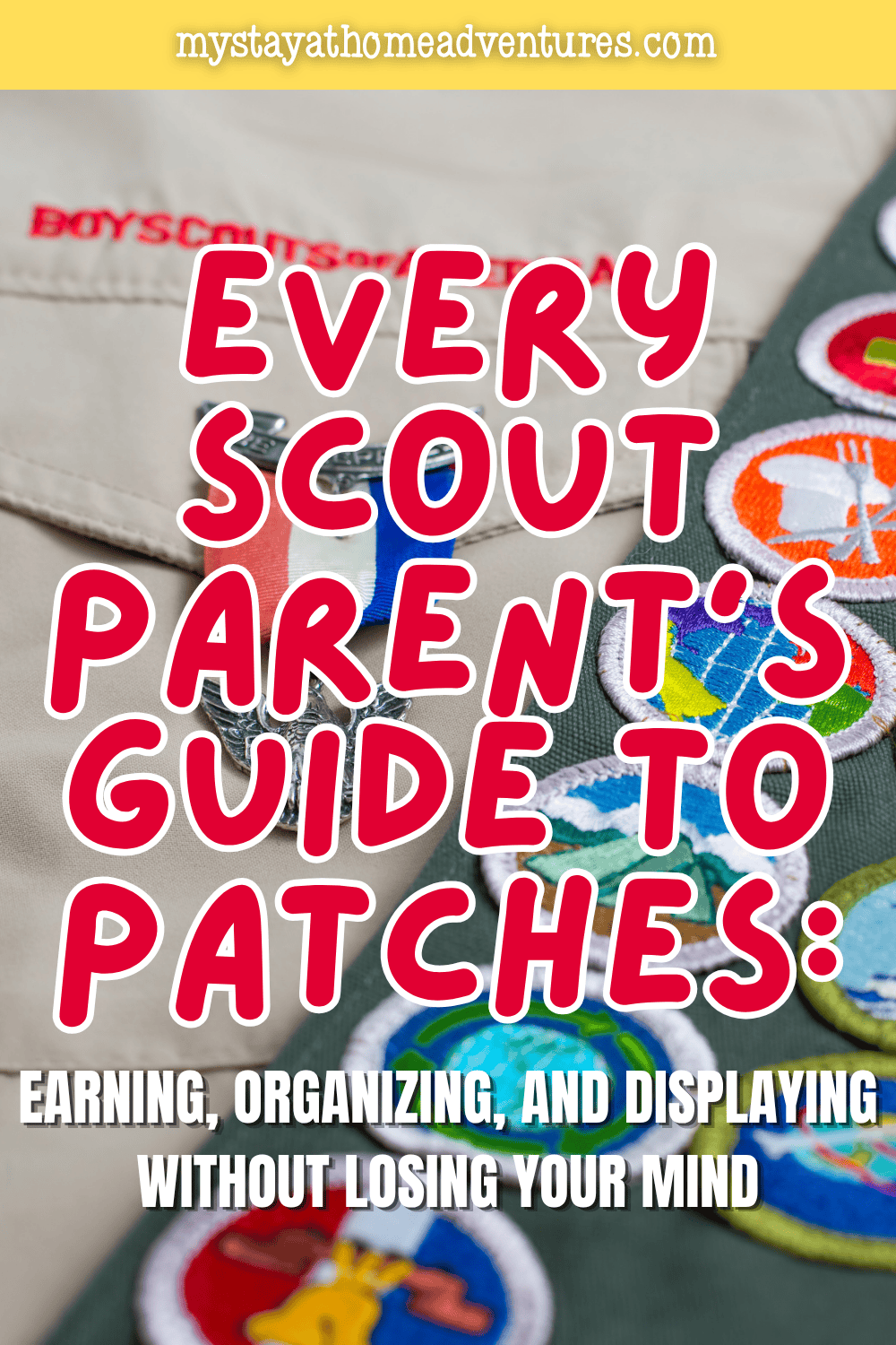 Scout sash filled with embroidered patches beside a uniform shirt for patch display and scouting achievements.