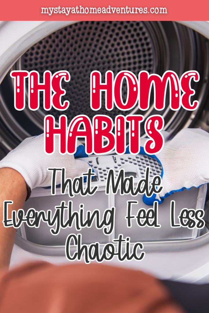 Hands cleaning inside a dryer lint trap, showing easy home habits that improve safety and keep routines running smoothly.