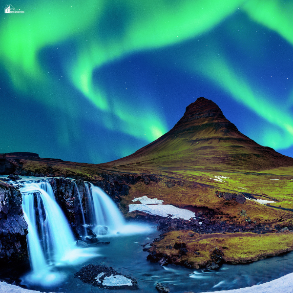 Scenic Iceland landscape with a mountain, waterfall, and northern lights, highlighting natural attractions for budget travel in Iceland.