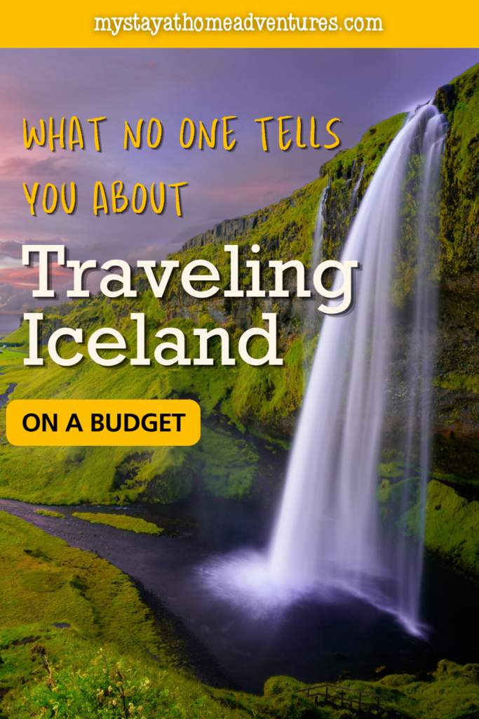 Tall waterfall flowing over green cliffs in Iceland, representing iconic sights travelers can enjoy while planning a budget-friendly trip.