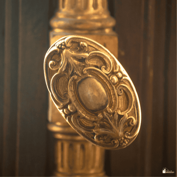 Antique-style decorative cabinet knob with detailed metalwork highlighting elegant home hardware design.
