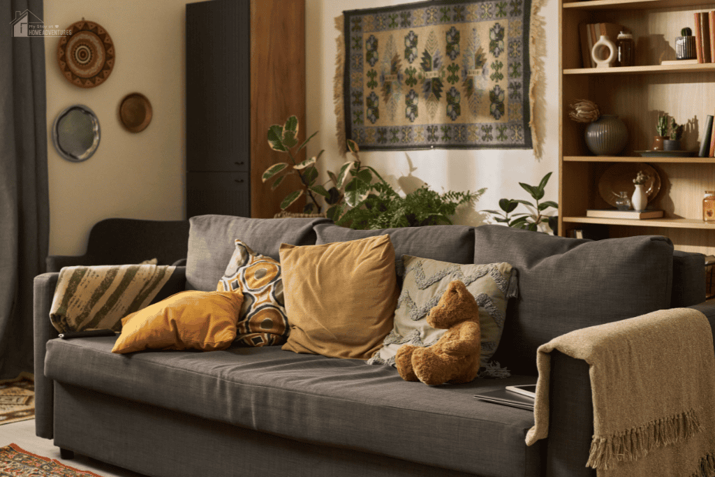 Cozy living room with sofa, warm pillows, plants, and soft lighting creating a comfortable space for everyday family life.