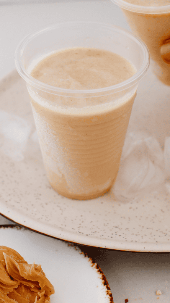Homemade peanut butter limber frozen in plastic cups for an easy Puerto Rican-style dessert.