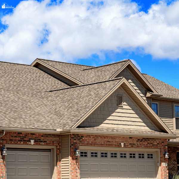 Newly installed residential roof with durable shingles designed to protect a home from weather damage and reduce long-term maintenance expenses.