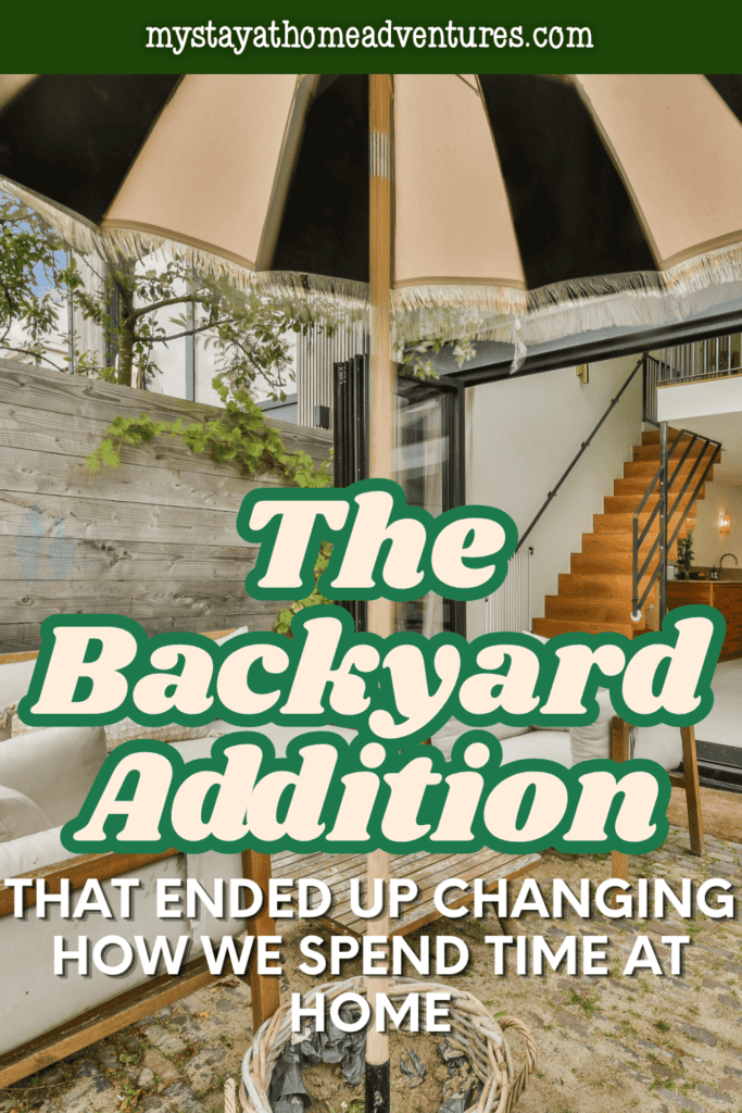 Stylish backyard patio with shaded seating and an open connection to the home, highlighting an inviting outdoor living space.