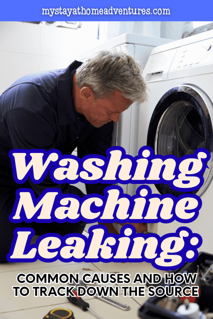 Technician inspecting a front-loading washing machine during a repair, troubleshooting the source of a household appliance water leak.
