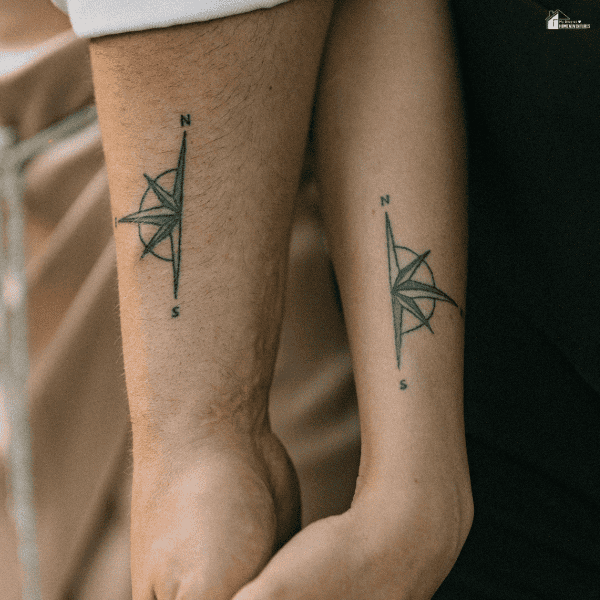 Matching fine line tattoos on two forearms showcasing precise linework and simple geometric-inspired body art.