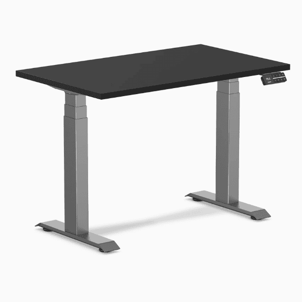 An adjustable standing desk with an electric height control is designed to support ergonomic work for users of different heights.