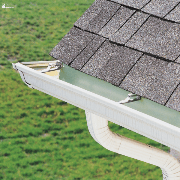 Well-maintained rain gutter installed along a residential roof to channel water away from the home's foundation.
