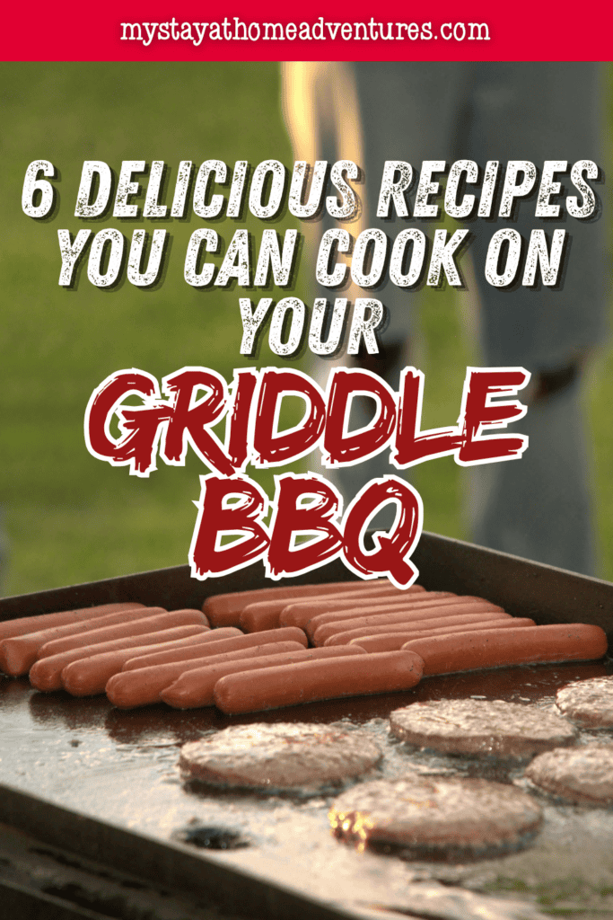 Hot dogs and burger patties cooking together on a large outdoor flat-top griddle during a backyard cookout.