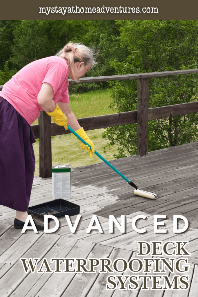 Person applying a protective coating to a wooden deck with a roller as part of a waterproofing and moisture protection process.