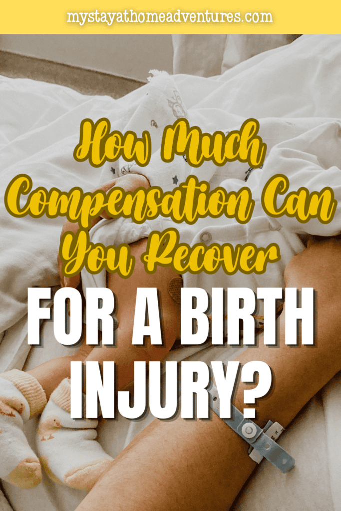 Newborn resting in a hospital bed with a parent’s hand nearby, representing medical care and compensation considerations following a birth injury.