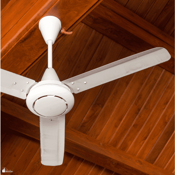 White ceiling fan mounted beneath a wooden patio roof to help circulate air and keep a backyard dining area cooler.