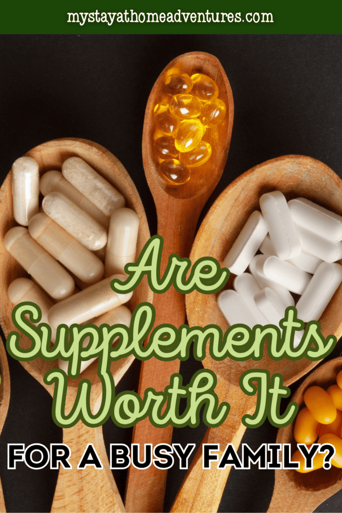 Various capsules, tablets, and softgels arranged on wooden spoons, representing supplement choices that busy families may consider for their nutritional needs.