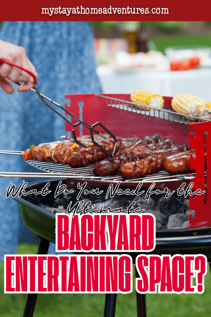 A person grills sausages and skewers for backyard entertaining, with corn warming above the charcoal.