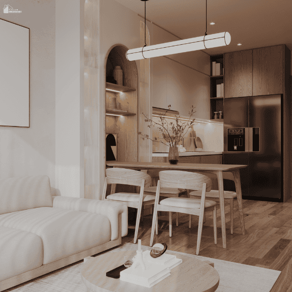 Modern open-concept living room, dining area, and kitchen showing how adding more living space can make a home feel larger and more functional.