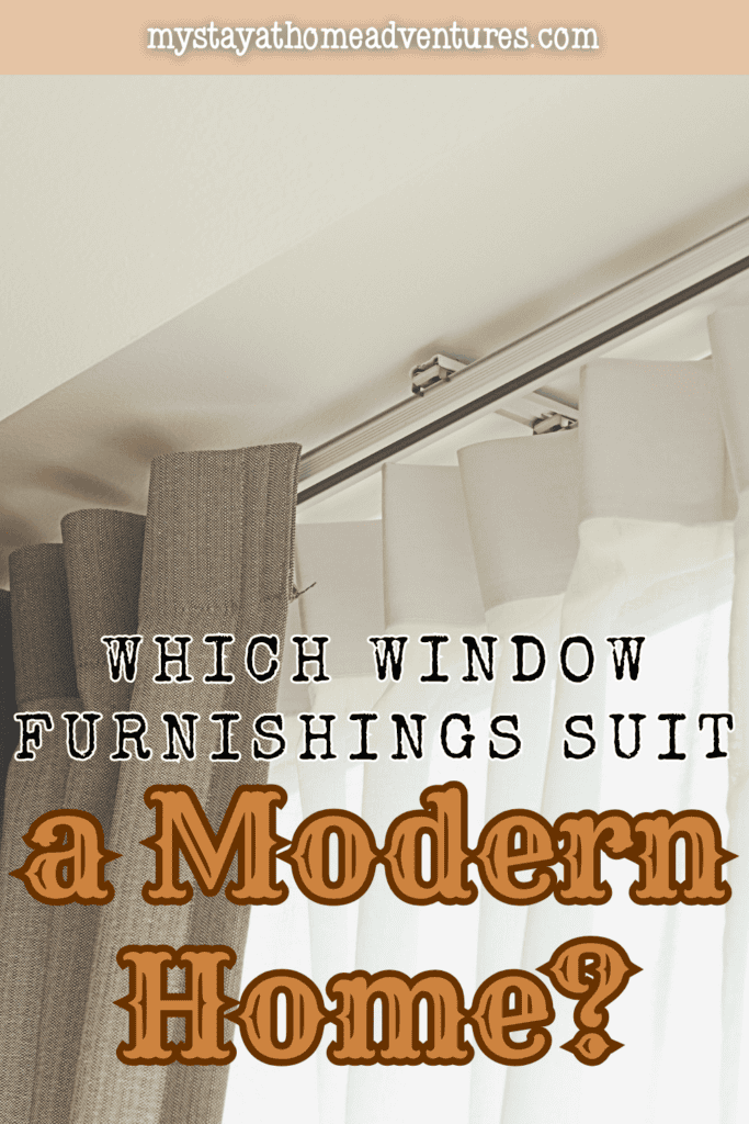 Brown and white curtains hang from a ceiling track as layered window furnishings.