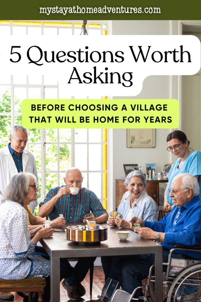 Older adults play cards with healthcare workers nearby, illustrating community life and support in a retirement village.