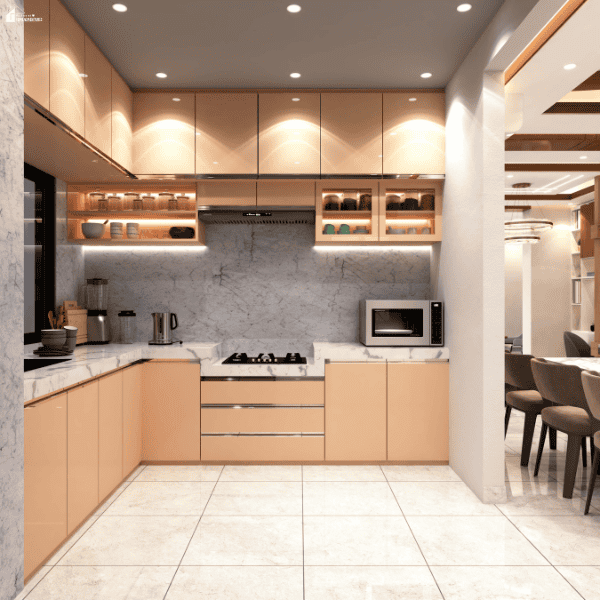 Modern kitchen with peach cabinets, marble-patterned countertops, recessed lighting, and illuminated shelves beside a dining area.